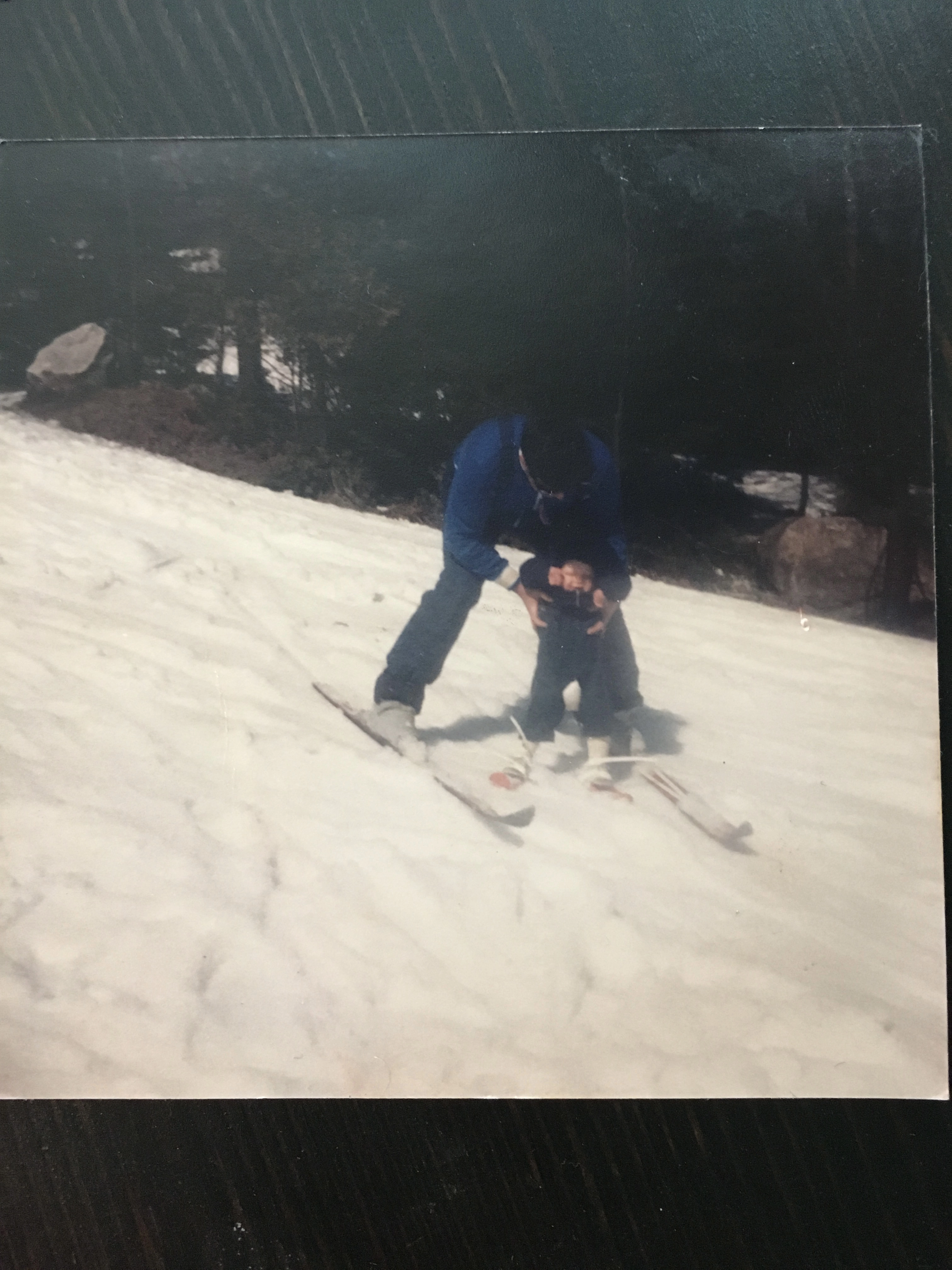 Baby AJ on skis with his dad at Mount Snow